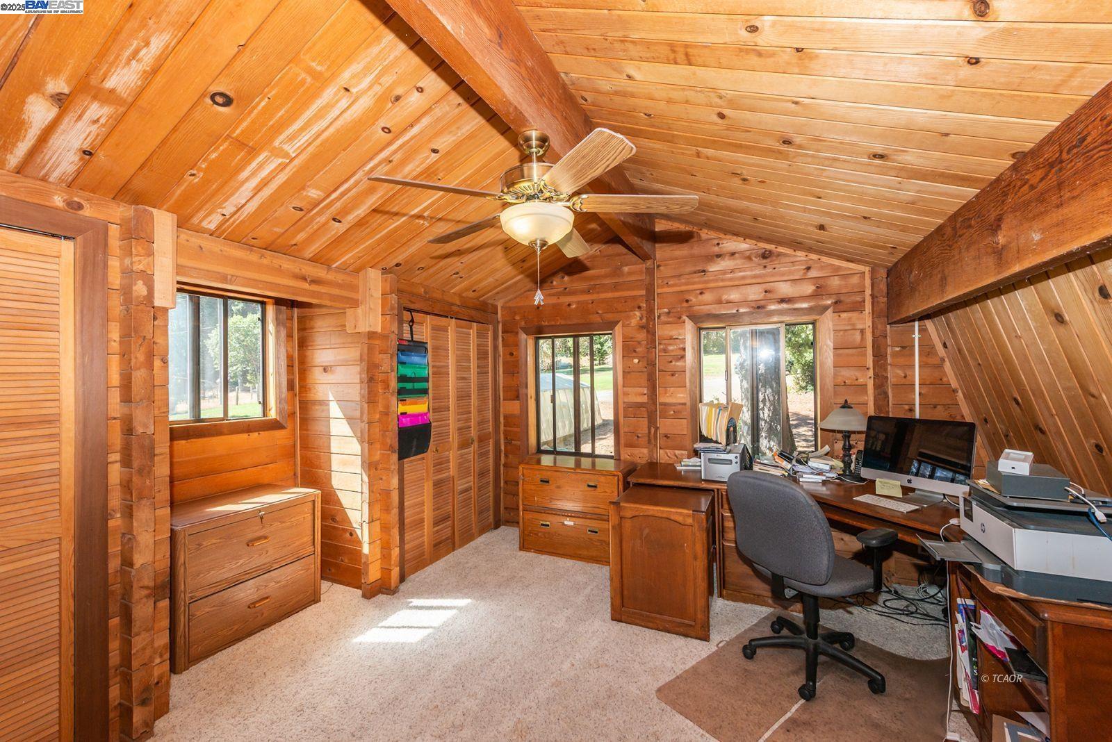 4481 Rush Creek Road Lewiston, CA 96052 - Photo 27 of 50 a view of a workspace with furniture and a window
