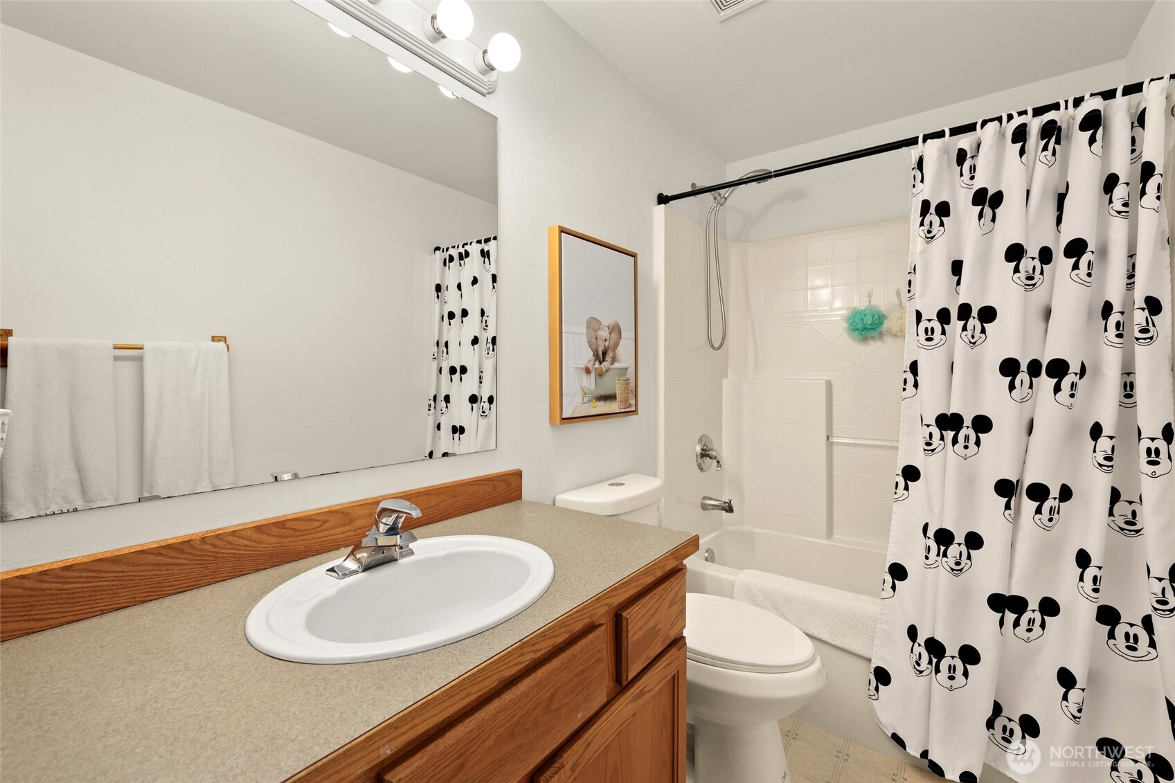 18207 Keona Lane Southwest Rochester, WA 98579 - Photo 19 of 35 a bathroom with a sink toilet tub and shower