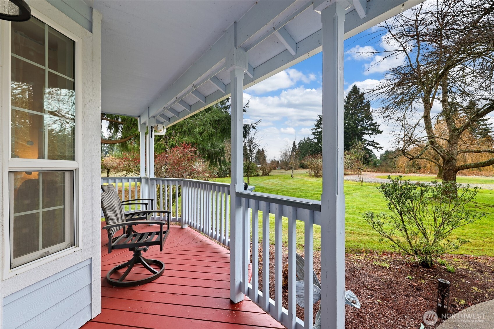 18207 Keona Lane Southwest Rochester, WA 98579 - Photo 21 of 35 a view of a balcony with wooden floor