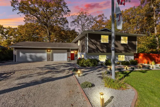 front view of a house with a yard