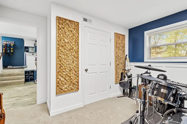 a view of a livingroom with furniture and windows
