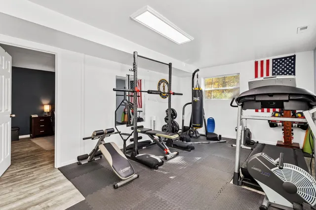 a view of a room with gym equipment
