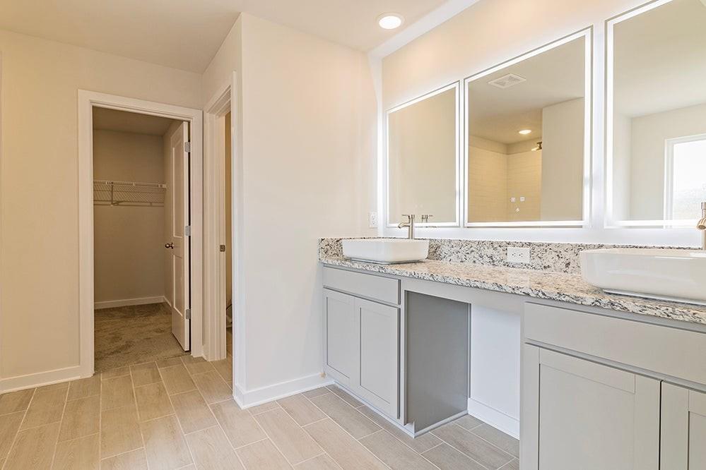 148 Post Oak Drive Jackson, GA 30233 - Photo 13 of 20 a bathroom with a granite countertop sink and a mirror