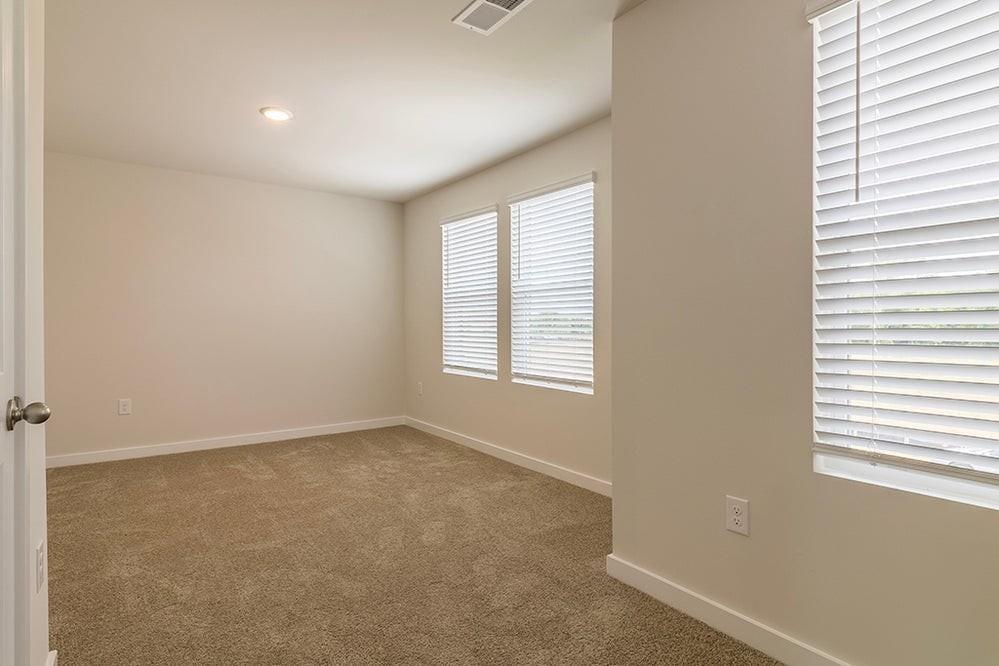 148 Post Oak Drive Jackson, GA 30233 - Photo 16 of 20 an empty room with a window