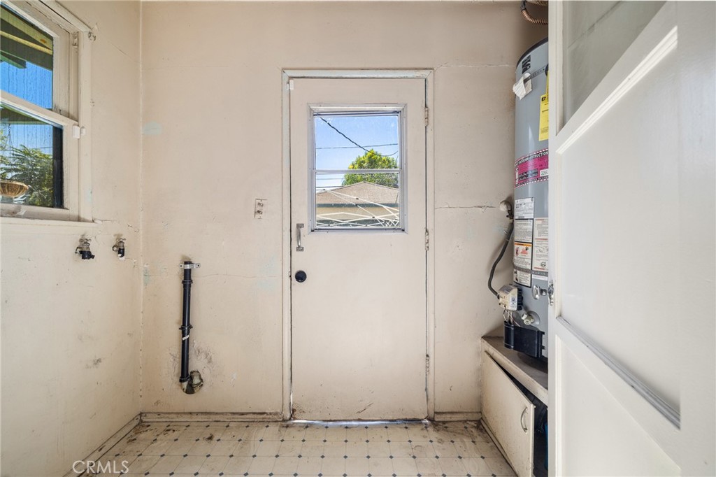 17650 Welby Way Lake Balboa, CA 91406 - Photo 15 of 38 a bathroom with a sink and a mirror