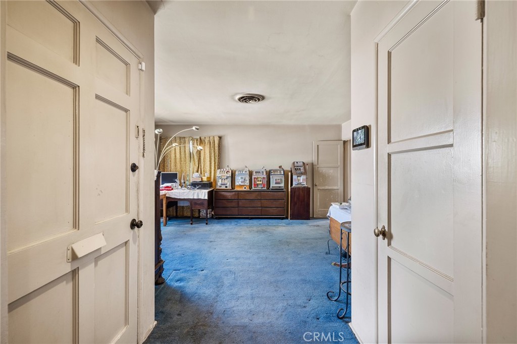 17650 Welby Way Lake Balboa, CA 91406 - Photo 25 of 38 a view of a bedroom with a car