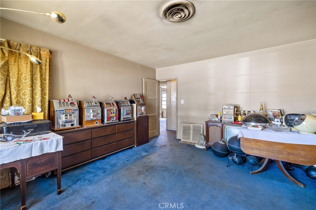 17650 Welby Way Lake Balboa, CA 91406 - Photo 5 of 38 a room with furniture and a table