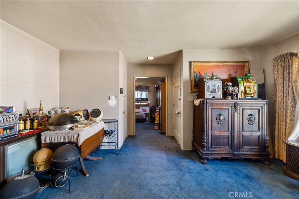 17650 Welby Way Lake Balboa, CA 91406 - Photo 6 of 38 a room with furniture and gym equipment