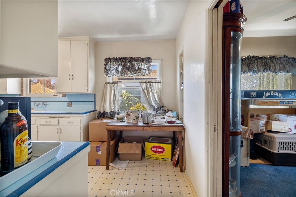 17650 Welby Way Lake Balboa, CA 91406 - Photo 10 of 38 a view of kitchen and dining room with furniture