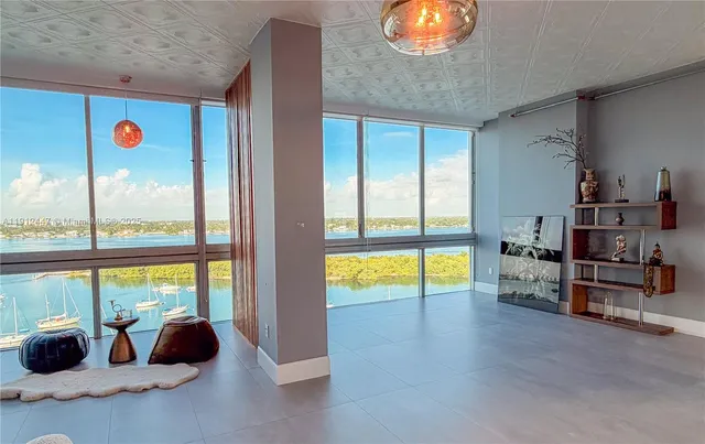 a view of an empty room and window