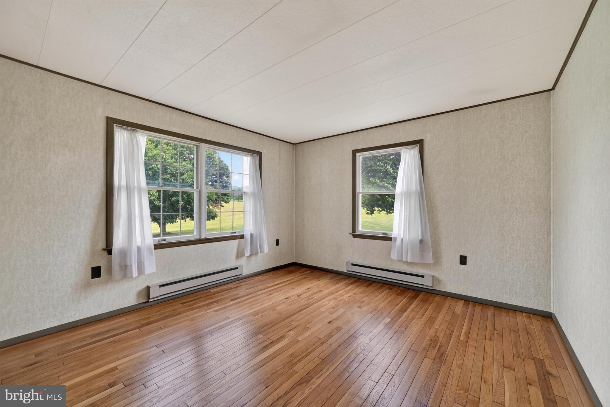 13835 Howard Road Dayton, MD 21036 - Photo 26 of 43 Secondary bedroom with refinished wood floors