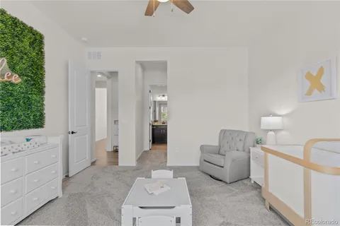 a living room with furniture and a area