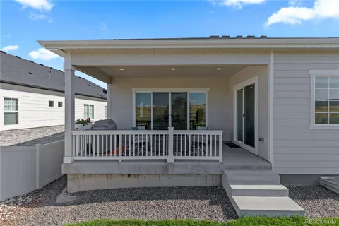 a view of a porch with a bench