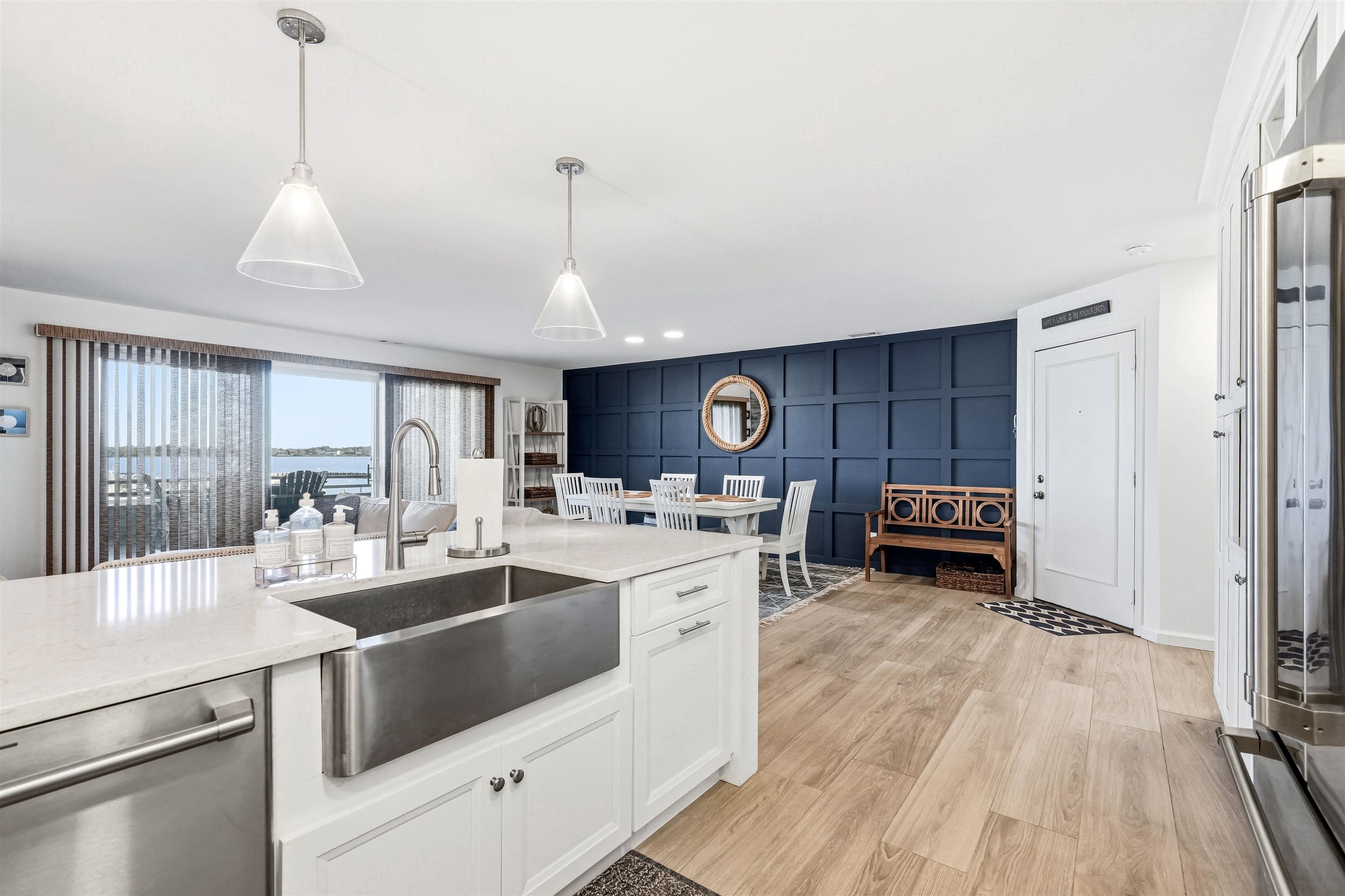 902 Ocean, Unit 906 Cape May, NJ 08204 - Photo 11 of 47 a kitchen with kitchen island granite countertop a sink appliances and cabinets
