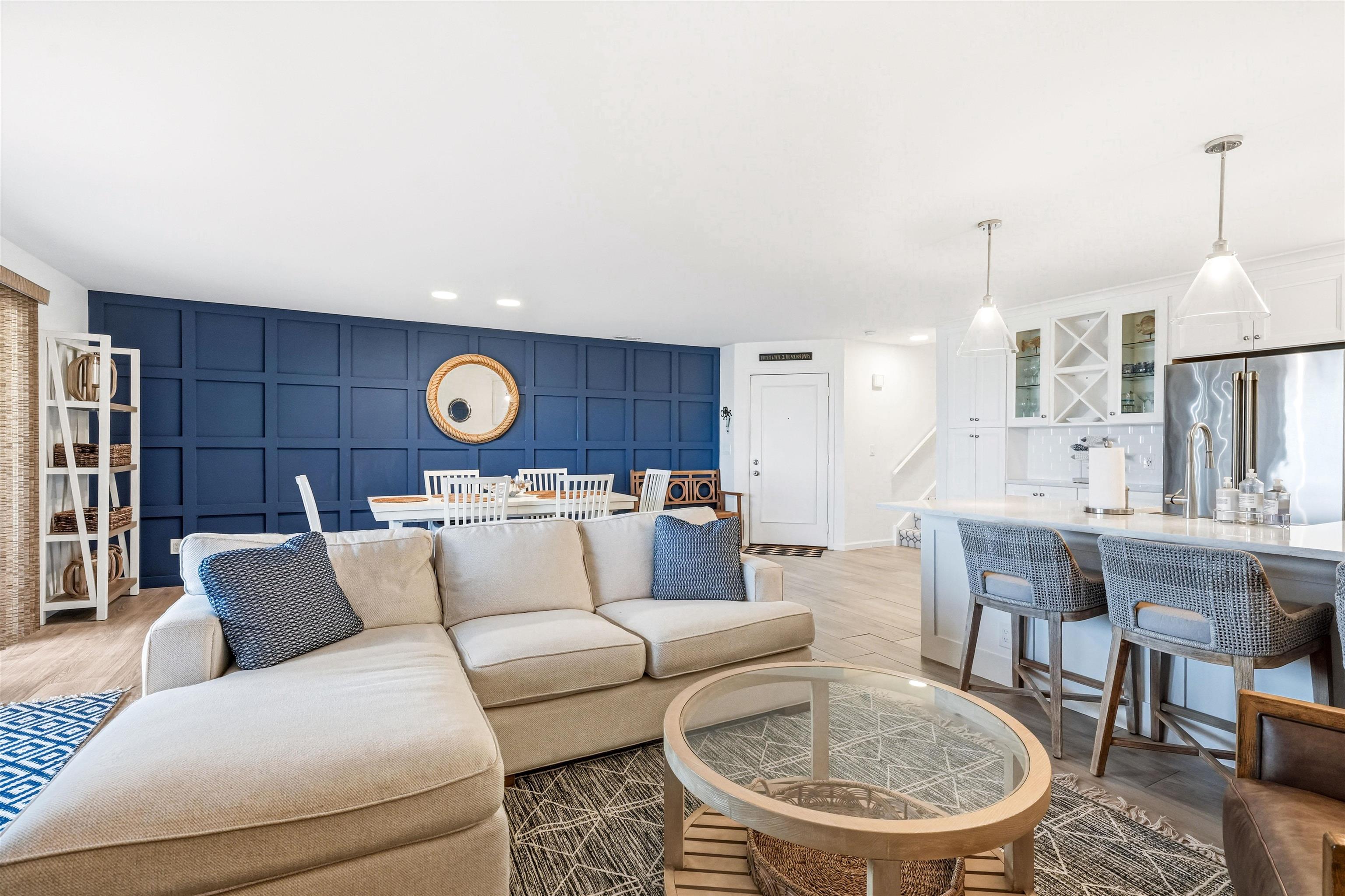 902 Ocean, Unit 906 Cape May, NJ 08204 - Photo 16 of 47 a living room with furniture and a wooden floor