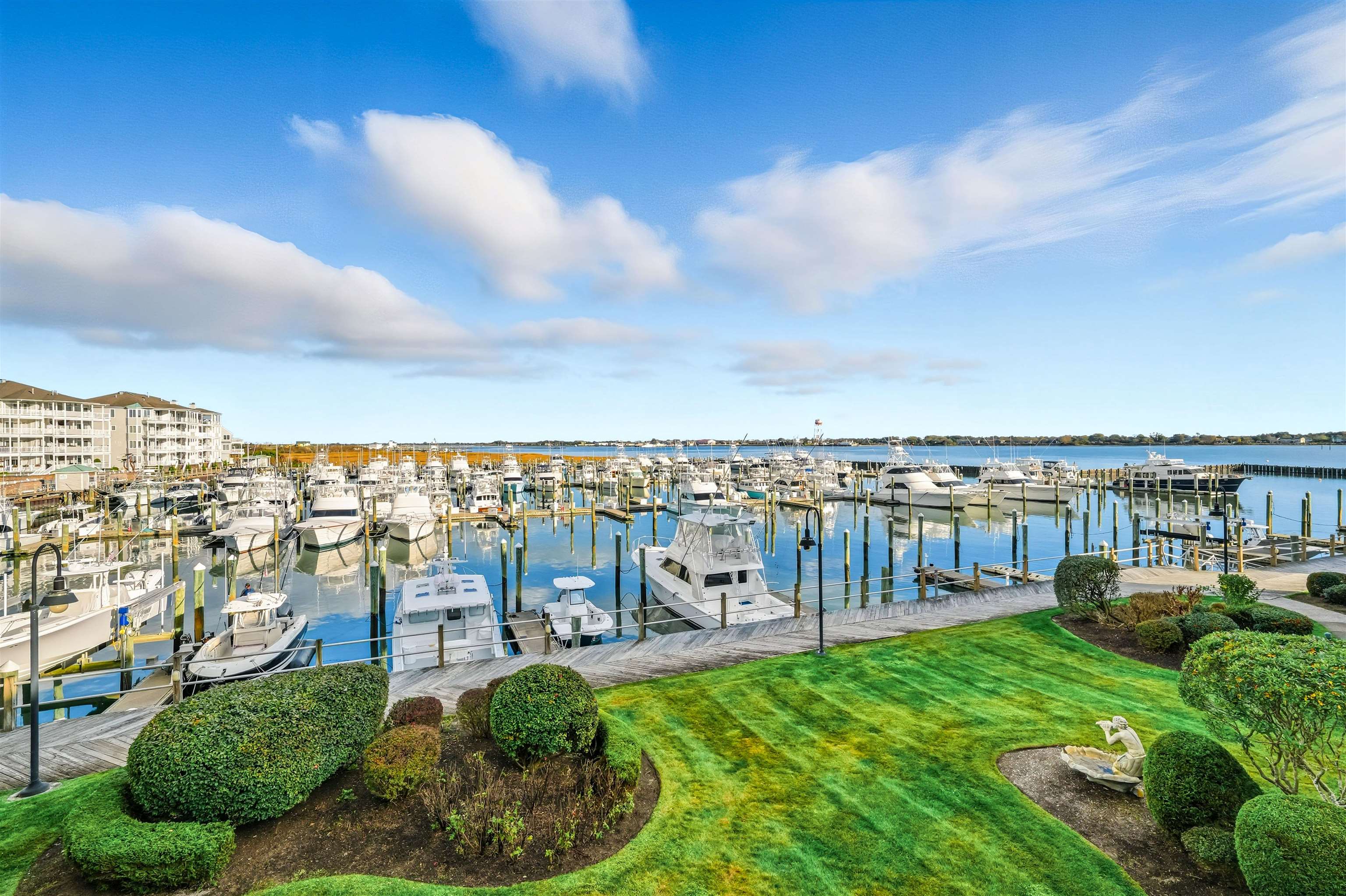 902 Ocean, Unit 906 Cape May, NJ 08204 - Photo 20 of 47 a view of a garden with lawn chairs
