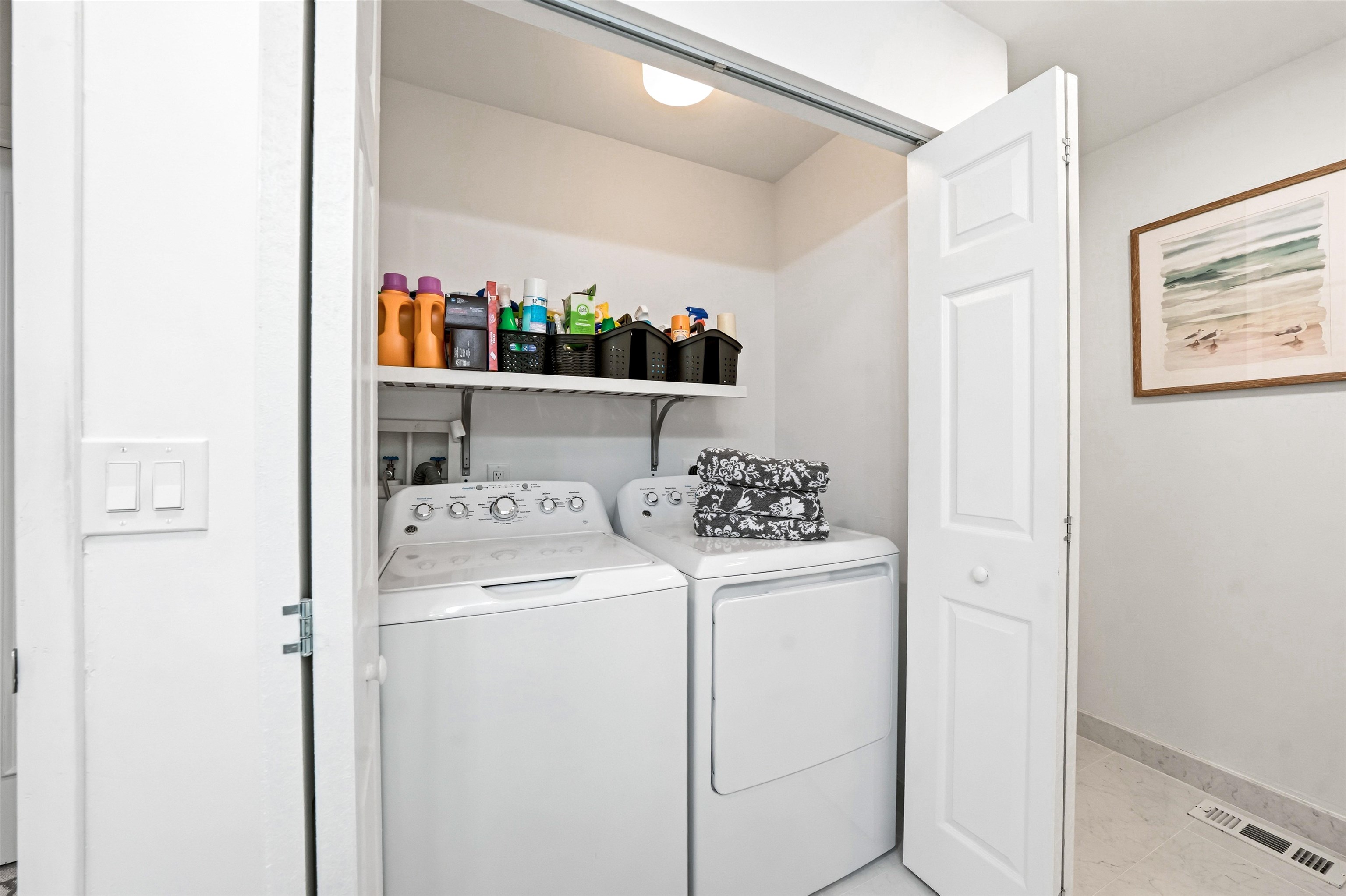 902 Ocean, Unit 906 Cape May, NJ 08204 - Photo 26 of 47 a utility room with dryer and washer