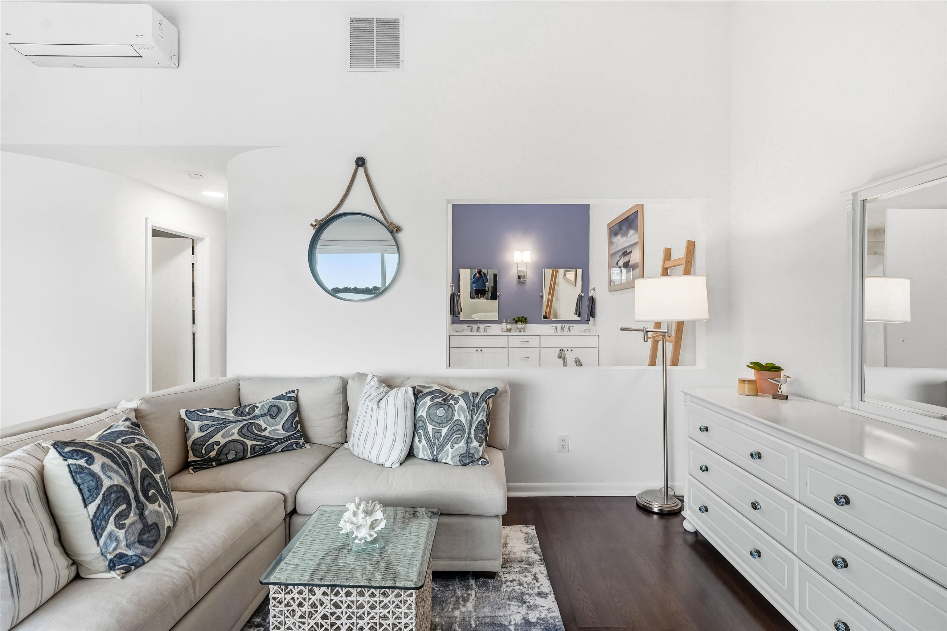 902 Ocean, Unit 906 Cape May, NJ 08204 - Photo 30 of 47 a living room with furniture and a lamp