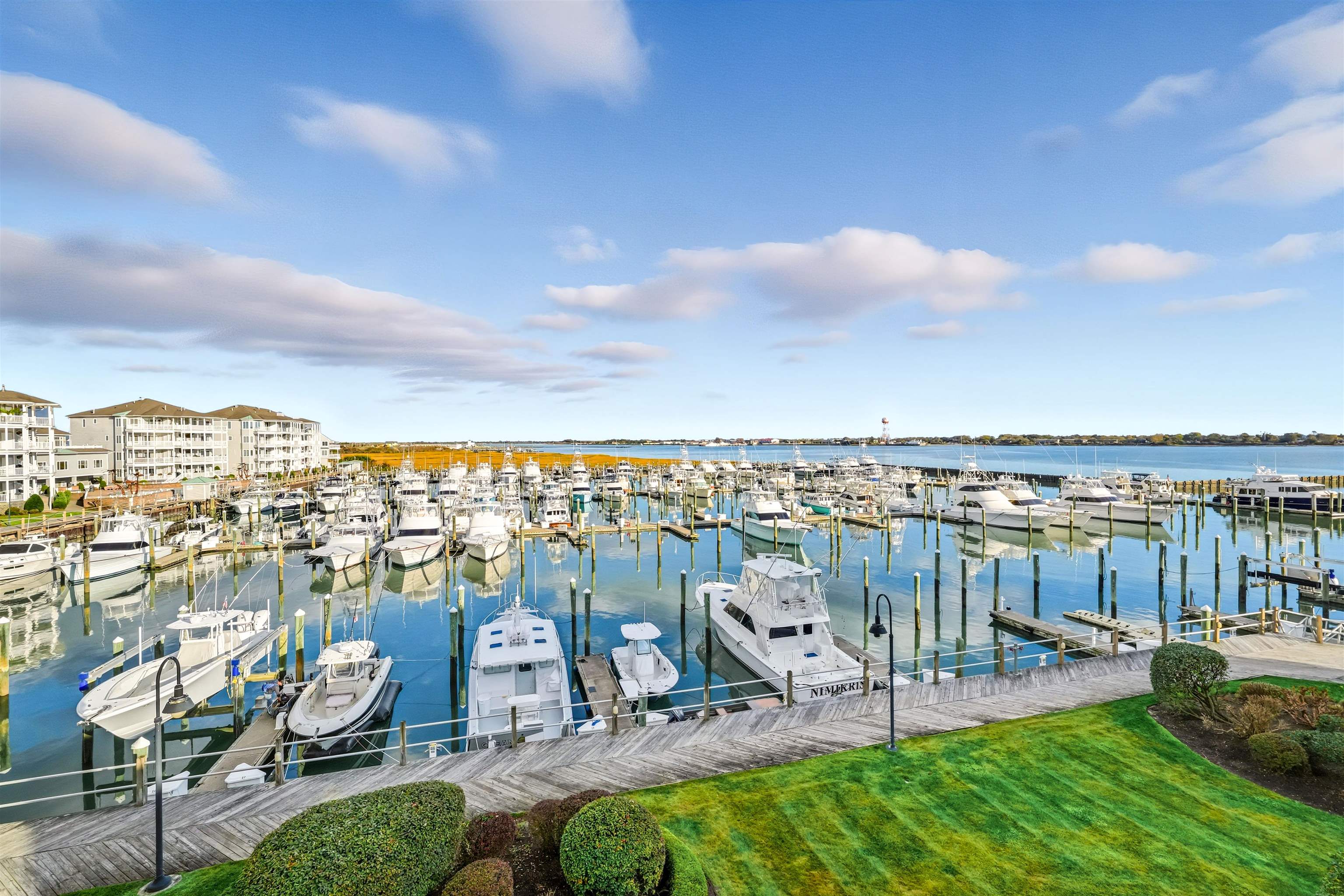 902 Ocean, Unit 906 Cape May, NJ 08204 - Photo 37 of 47 a view of a chairs and table on the terrace