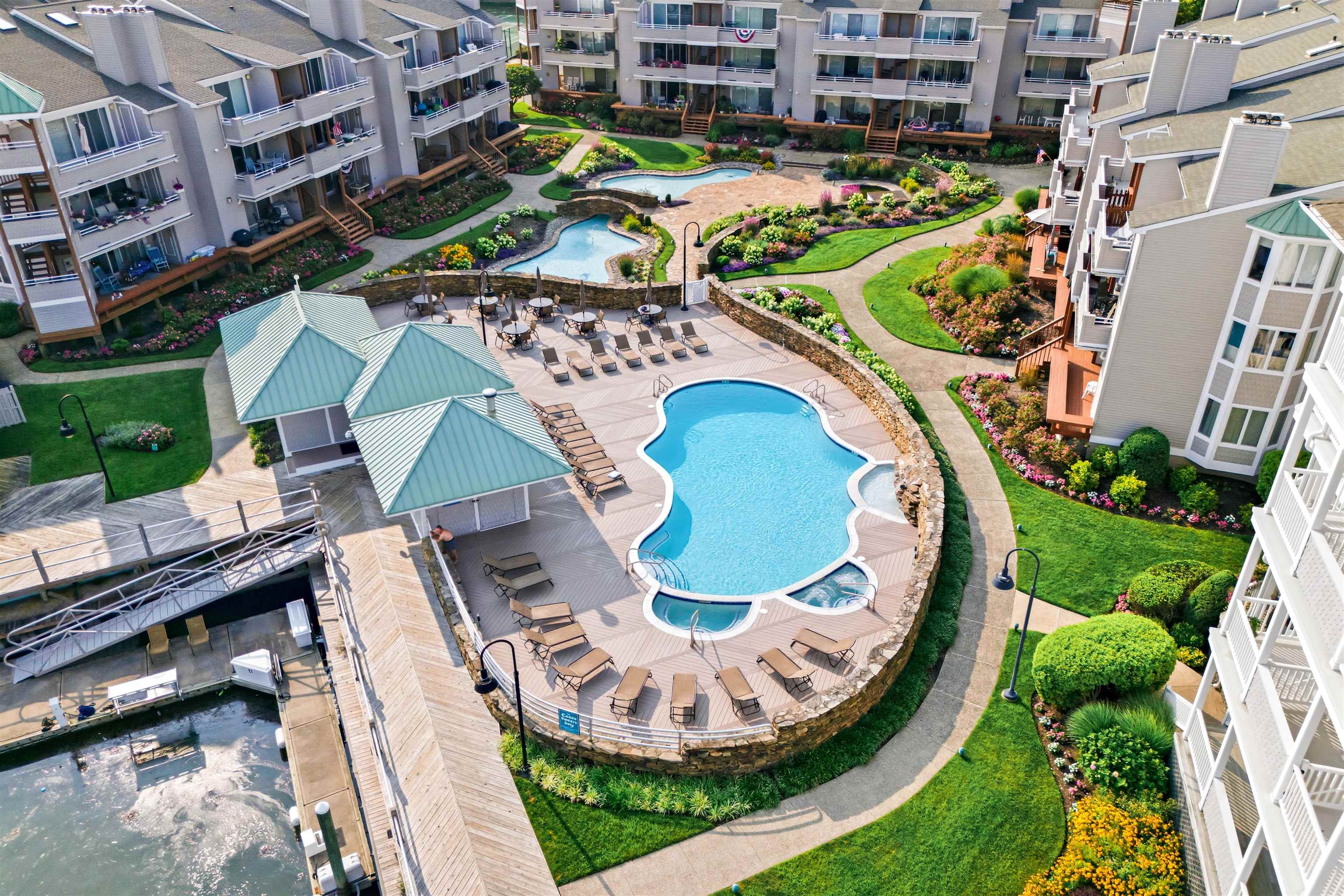 902 Ocean, Unit 906 Cape May, NJ 08204 - Photo 39 of 47 an aerial view of a house with a swimming pool outdoor seating and entertaining space