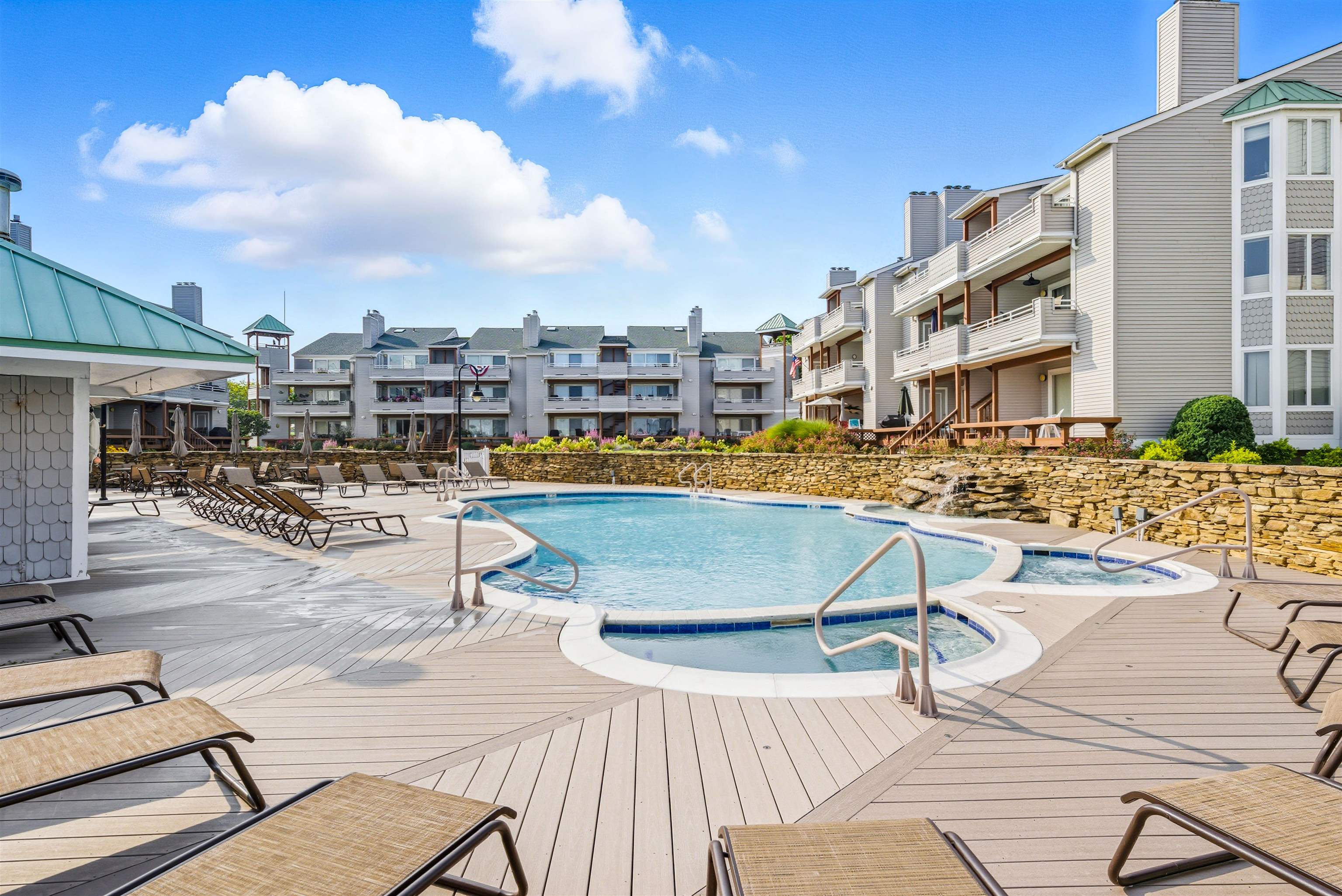 902 Ocean, Unit 906 Cape May, NJ 08204 - Photo 40 of 47 a view of a swimming pool with outdoor seating
