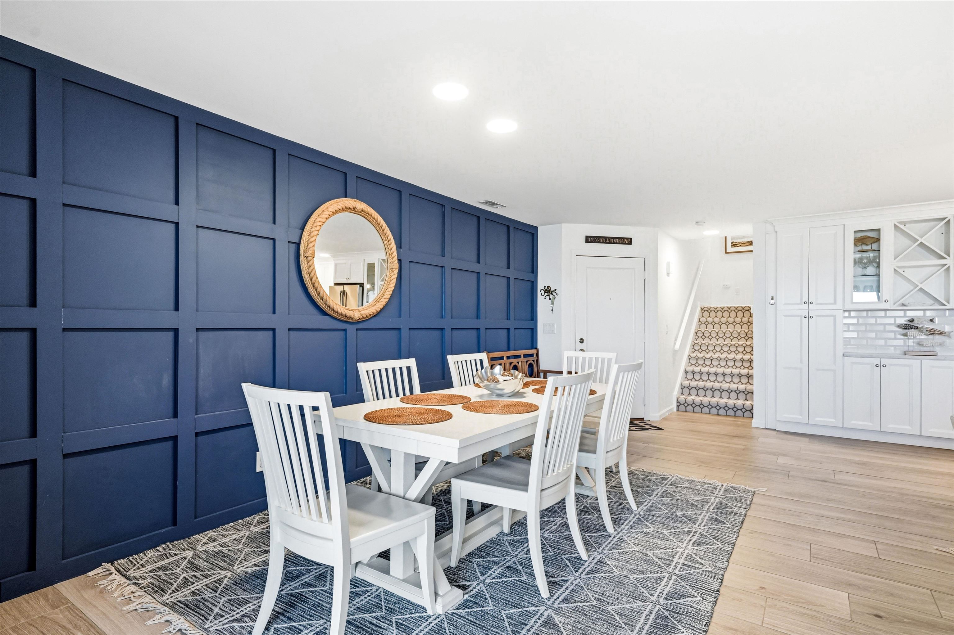 902 Ocean, Unit 906 Cape May, NJ 08204 - Photo 6 of 47 a view of a dining room with furniture and wooden floor