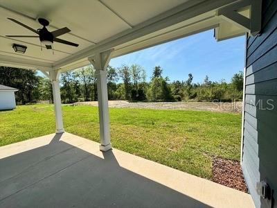 5949 South E County Road 21B Keystone Heights, FL 32656 - Photo 27 of 30 a view of a porch and garden