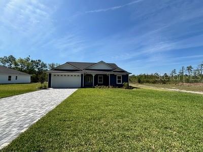 5949 South E County Road 21B Keystone Heights, FL 32656 - Photo 4 of 30 a front view of a house with a yard