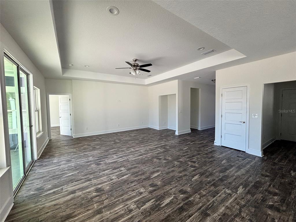 5949 South E County Road 21B Keystone Heights, FL 32656 - Photo 9 of 30 a view of a livingroom with a ceiling fan and window
