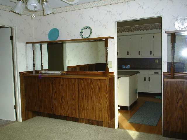 2511 West Florence Road Freeport, IL 61032 - Photo 7 of 9 a kitchen with a refrigerator and a sink