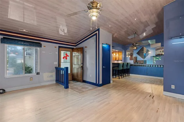 a view of livingroom with furniture and wooden floor