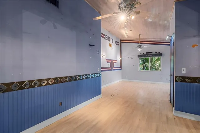 a view of a hallway with a window