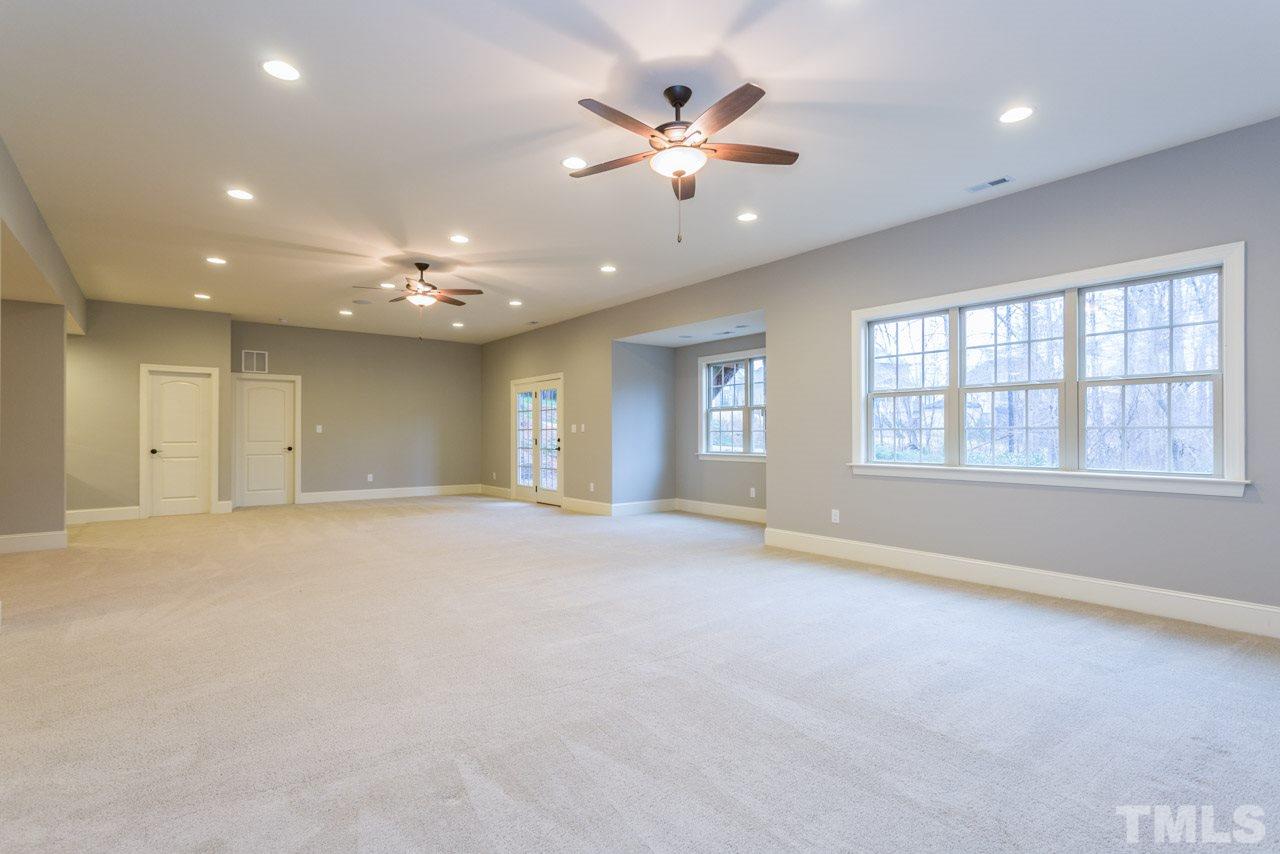 5011 Pomfret Point Raleigh, NC 27612 - Photo 20 of 25 The finished basement is HUGE! It can easily accommodate a pool table, ping pong table, exercise equipment and seating. You choose!