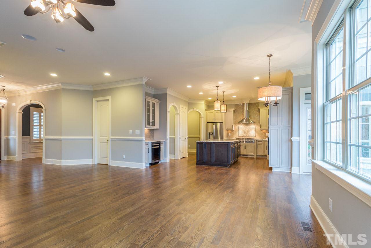 5011 Pomfret Point Raleigh, NC 27612 - Photo 5 of 25 The family room is open to the kitchen and breakfast room. The family room can easily accommodate a sectional sofa.