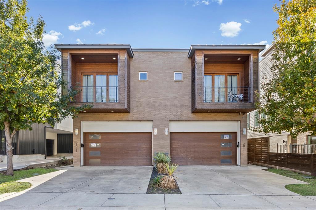 a front view of a house with yard