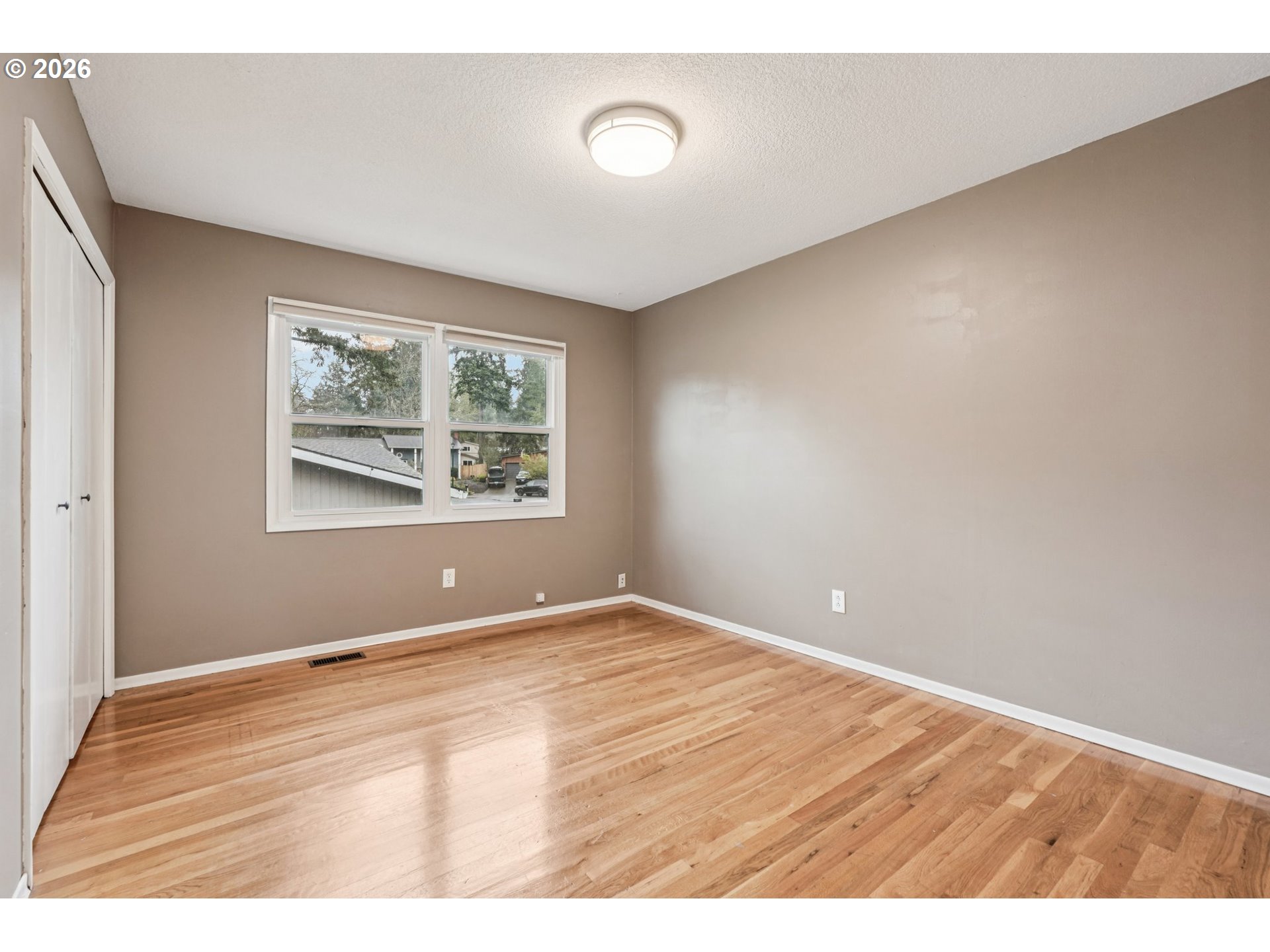 7670 Southwest Danielle Avenue Beaverton, OR 97008 - Photo 23 of 38 a view of an empty room with window
