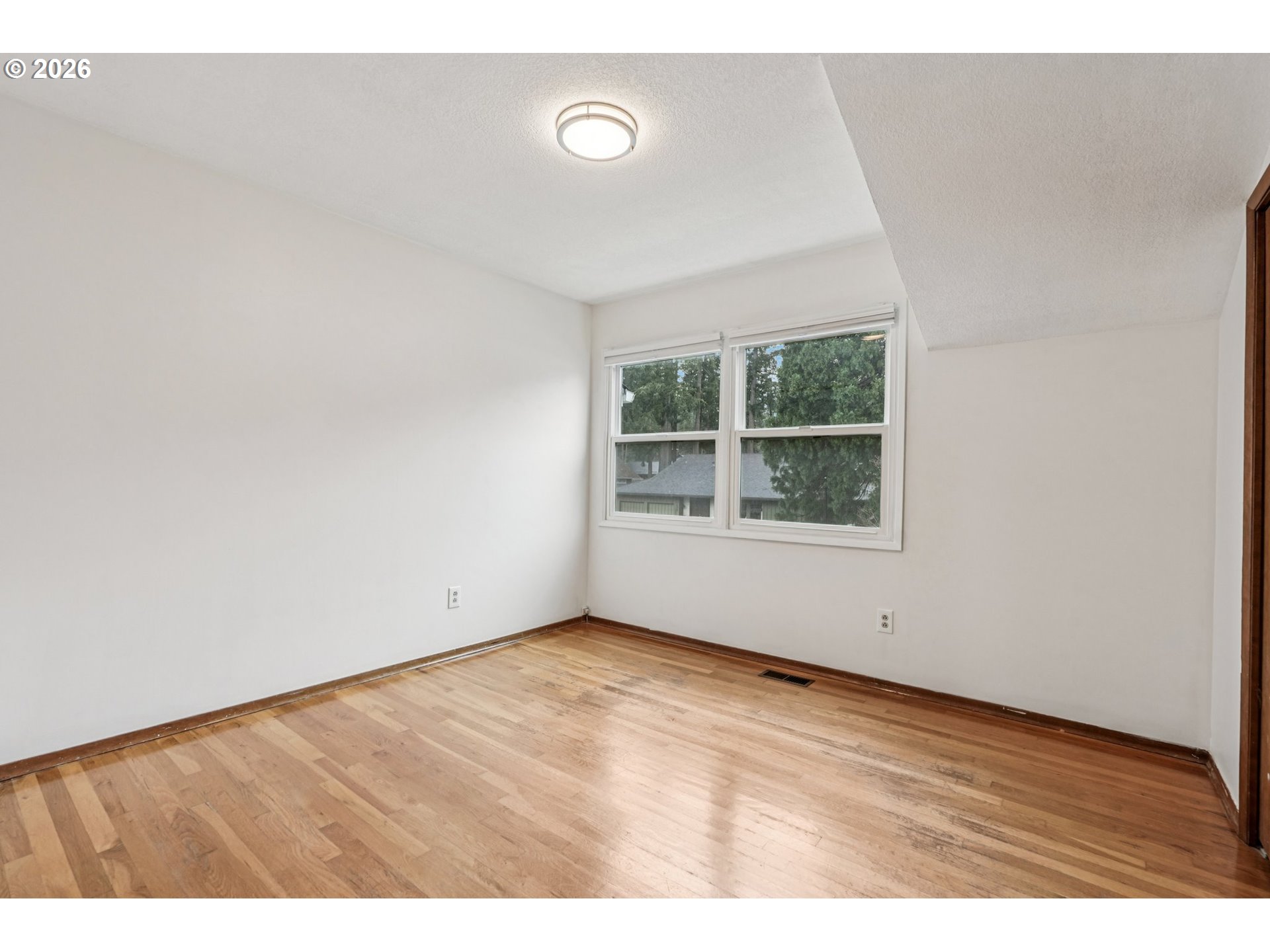 7670 Southwest Danielle Avenue Beaverton, OR 97008 - Photo 27 of 38 a view of an empty room with a window