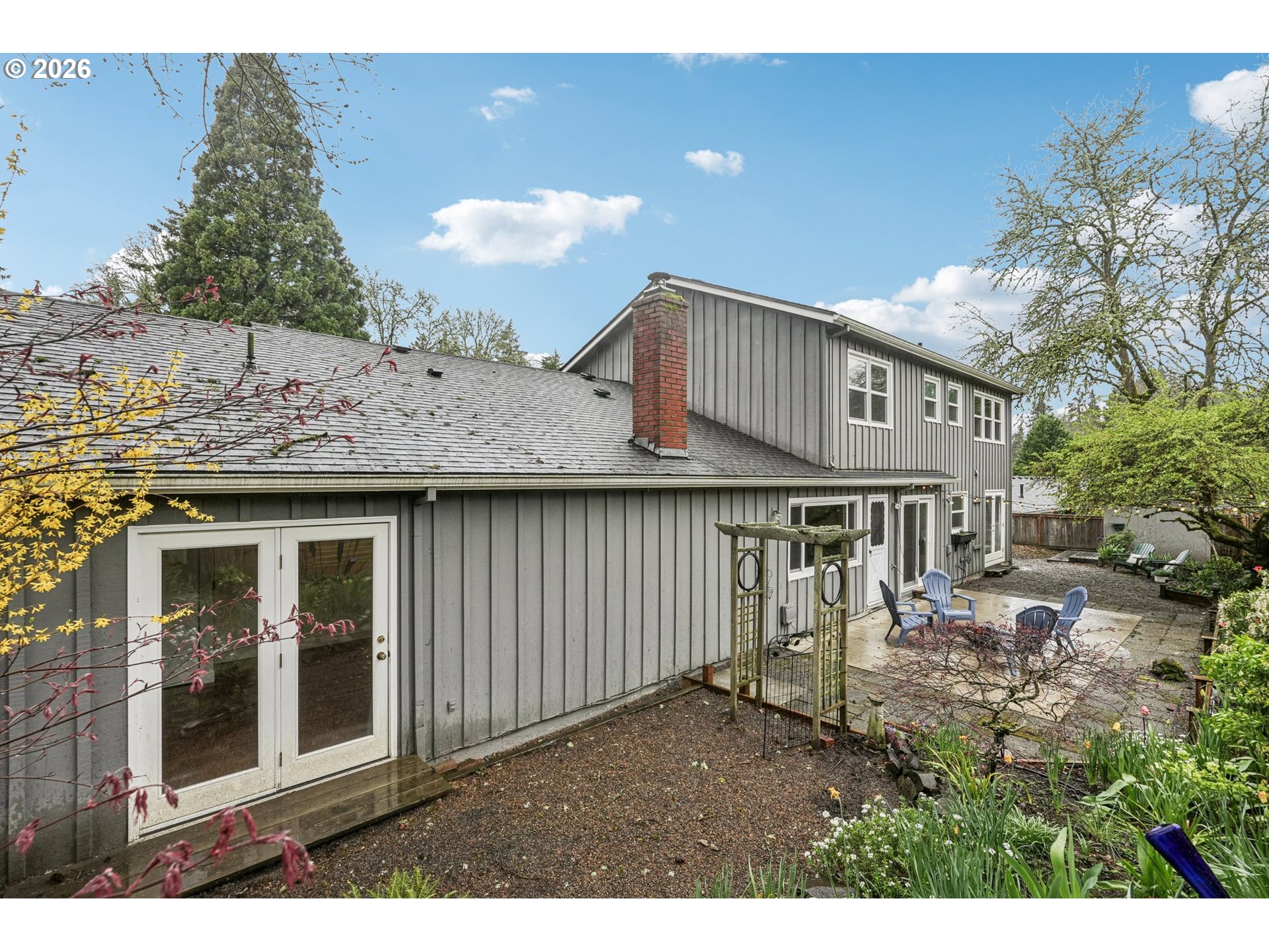 7670 Southwest Danielle Avenue Beaverton, OR 97008 - Photo 36 of 38 a view of a house with a backyard