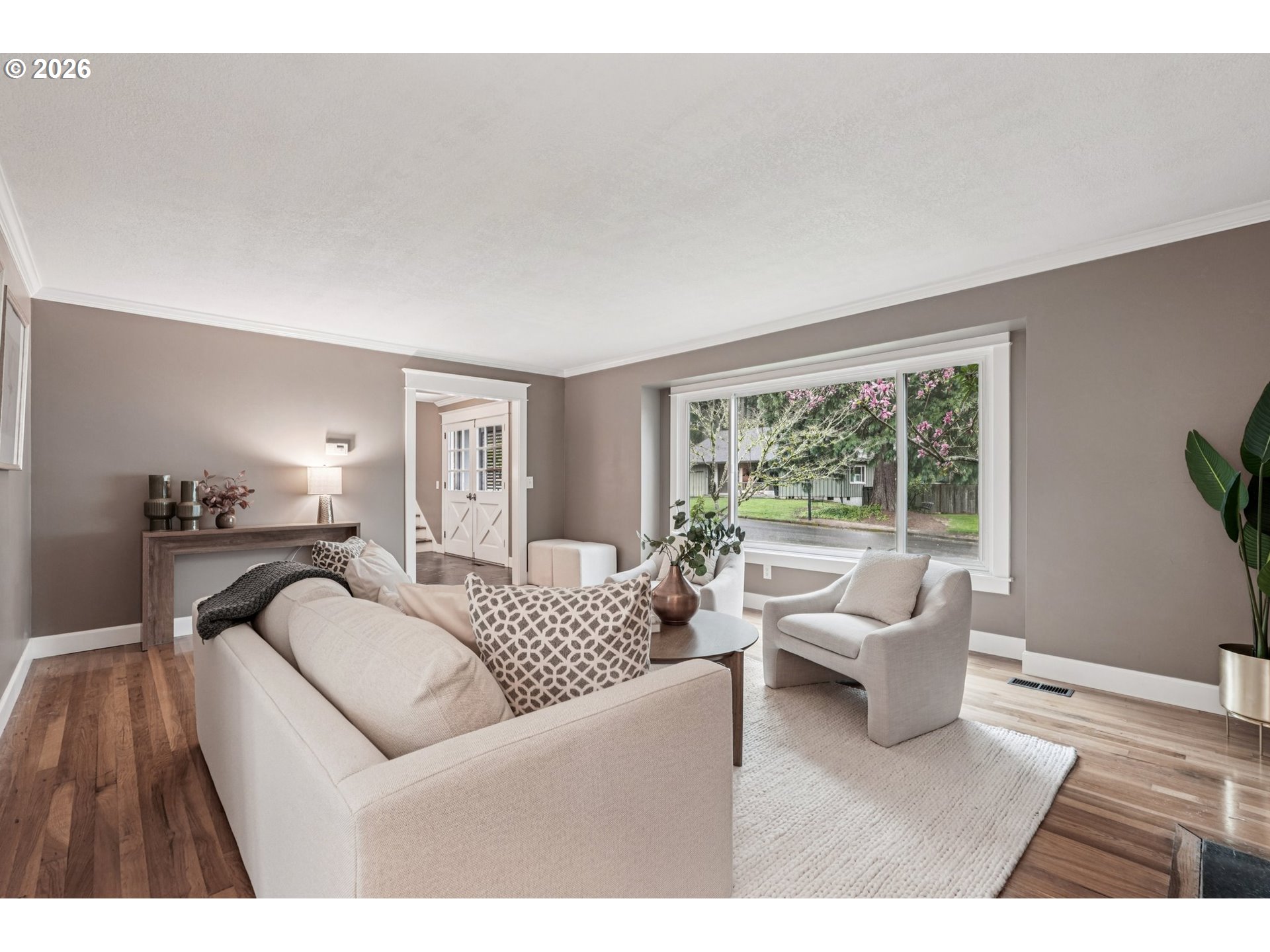 7670 Southwest Danielle Avenue Beaverton, OR 97008 - Photo 7 of 38 a living room with furniture and a large window