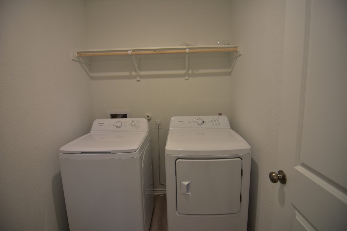 343 Keefer Kyle, TX 78640 - Photo 21 of 38 Laundry room with washing machine and dryer