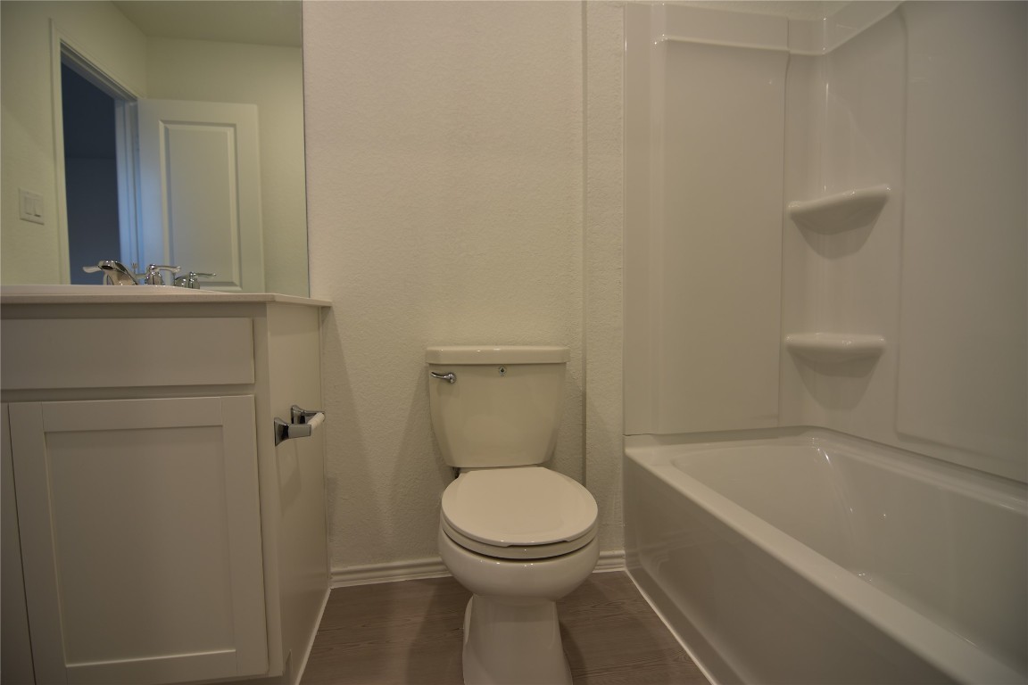 343 Keefer Kyle, TX 78640 - Photo 27 of 38 Full bathroom with vanity and shower combination