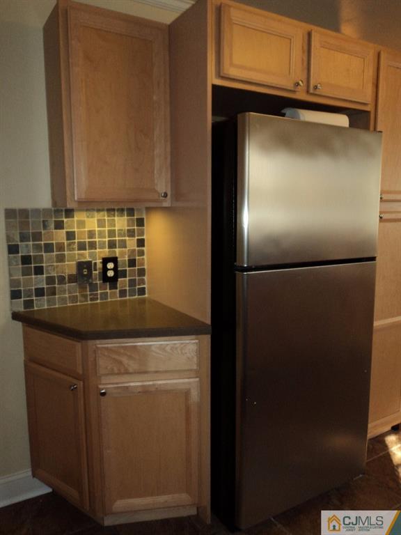 515 Sutherland Road Ewing, NJ 08618 - Photo 12 of 25 a kitchen with stainless steel appliances granite countertop a refrigerator and a cabinets