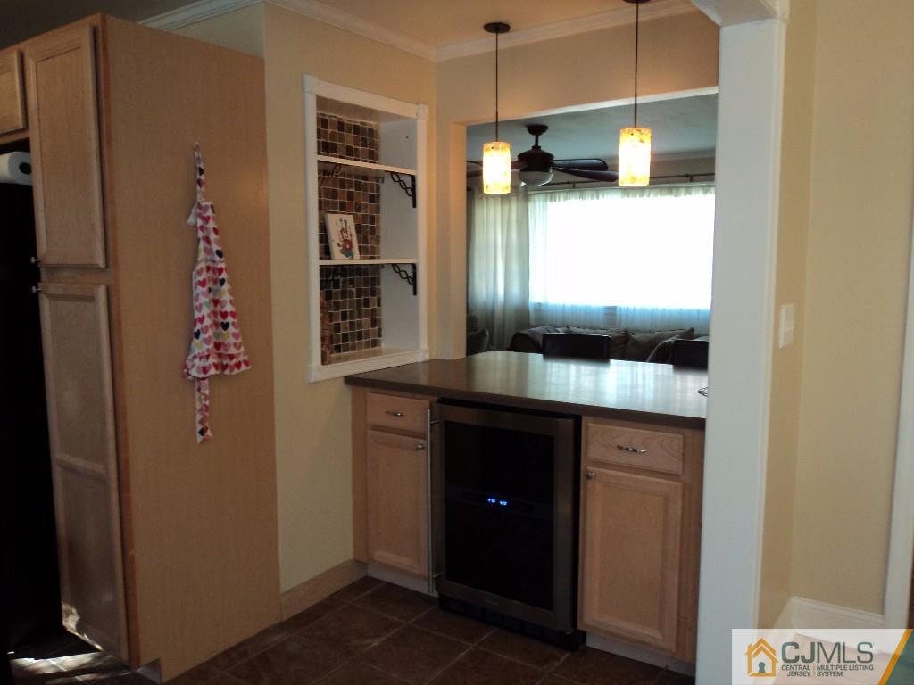 515 Sutherland Road Ewing, NJ 08618 - Photo 14 of 25 a bathroom with granite countertop a sink and a shower
