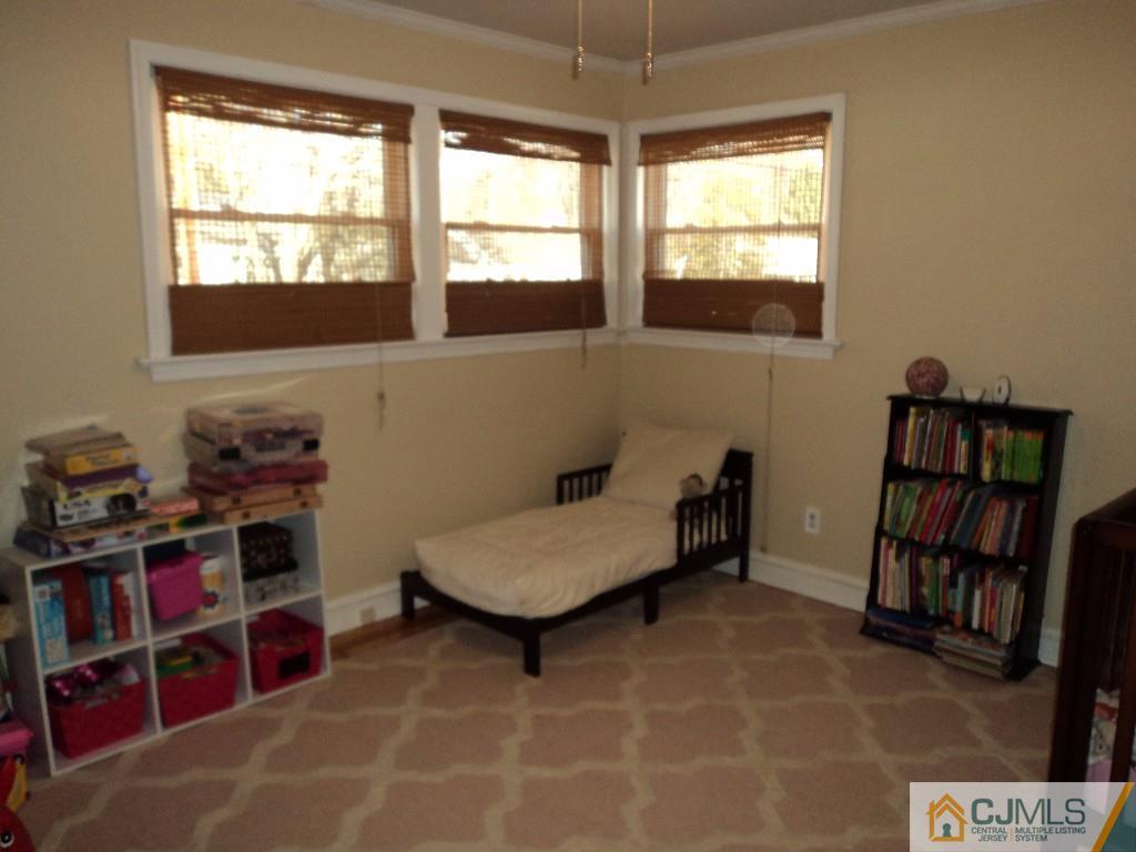 515 Sutherland Road Ewing, NJ 08618 - Photo 17 of 25 a living room with furniture and a window