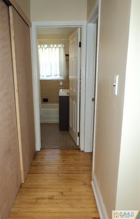 515 Sutherland Road Ewing, NJ 08618 - Photo 20 of 25 a bathroom with a sink and a mirror
