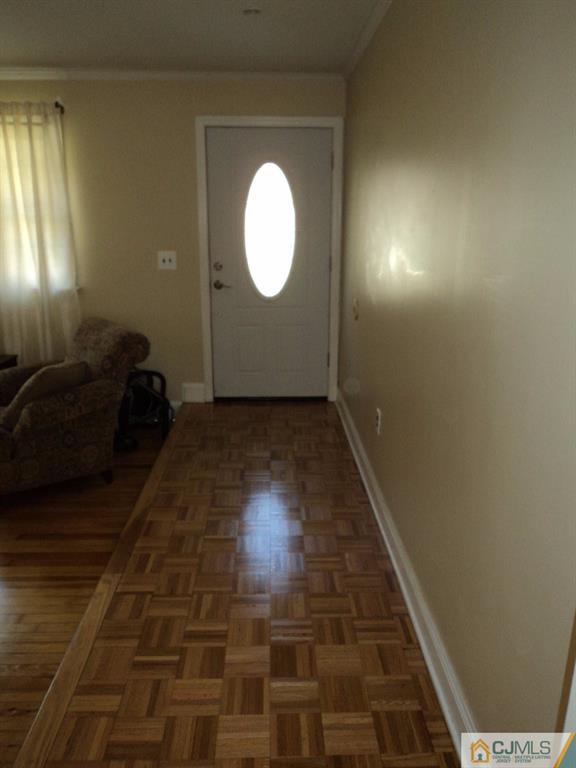 515 Sutherland Road Ewing, NJ 08618 - Photo 21 of 25 a view of a livingroom with wooden floor and a large window