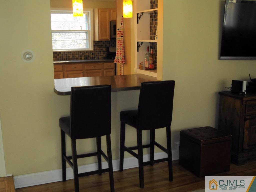 515 Sutherland Road Ewing, NJ 08618 - Photo 23 of 25 a view of a workspace room with furniture and wooden floor
