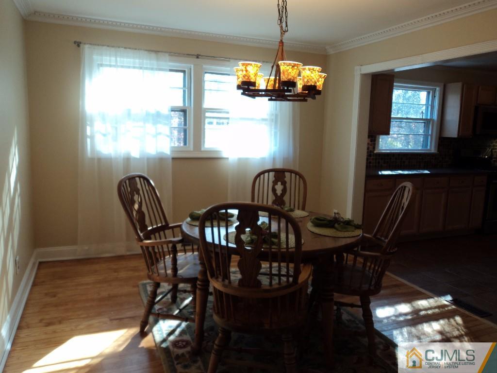 515 Sutherland Road Ewing, NJ 08618 - Photo 7 of 25 a view of a dining room with furniture and window