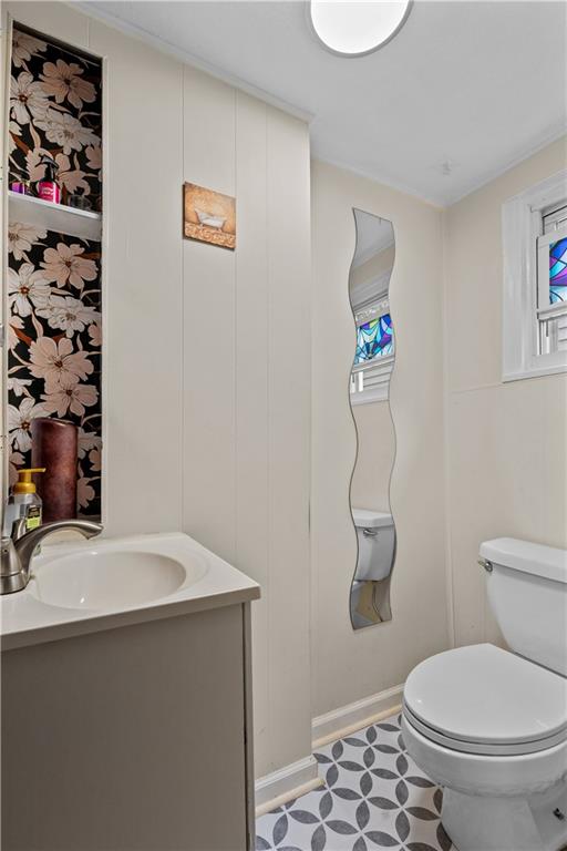 115 Frederick Street Mount Oliver, PA 15210 - Photo 11 of 35 a bathroom with a sink a toilet and shower curtain