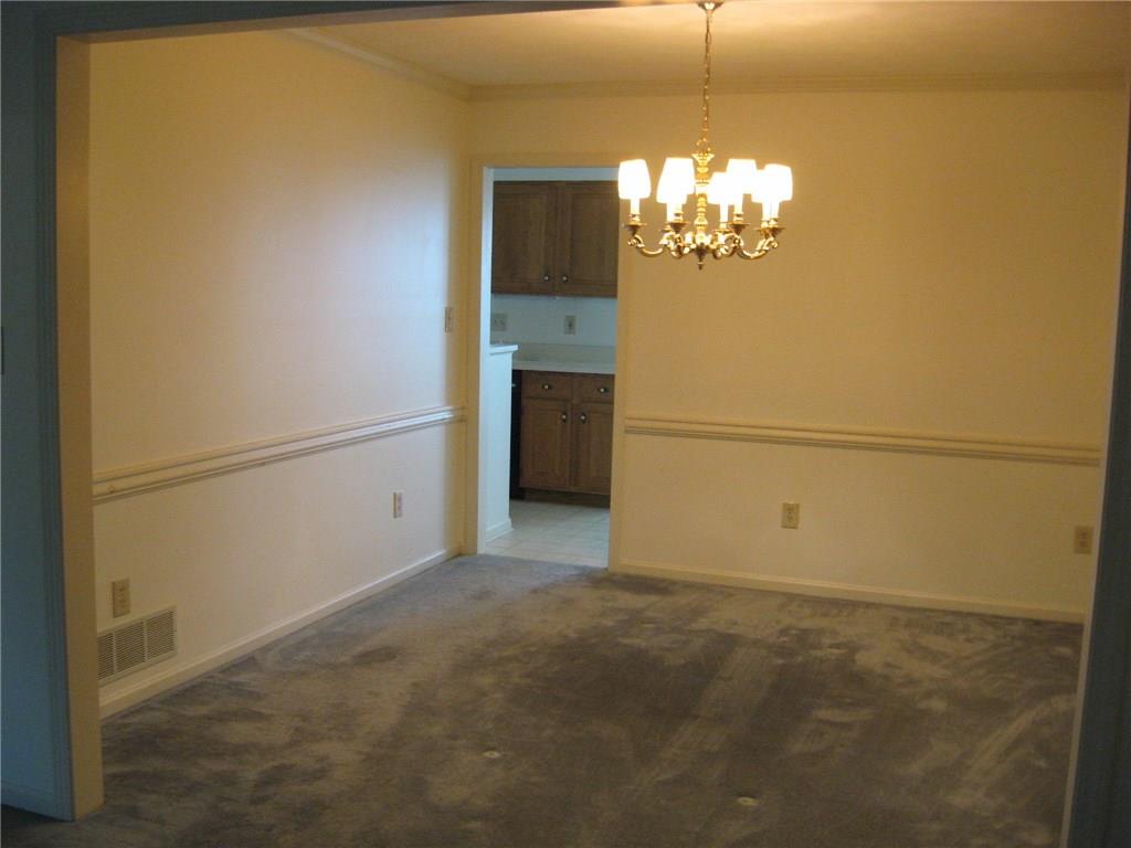 141 Shadow Ridge Drive Pittsburgh, PA 15238 - Photo 3 of 21 DINING ROOM LEADING TO KITCHEN - COULD TAKE WALL DOWN